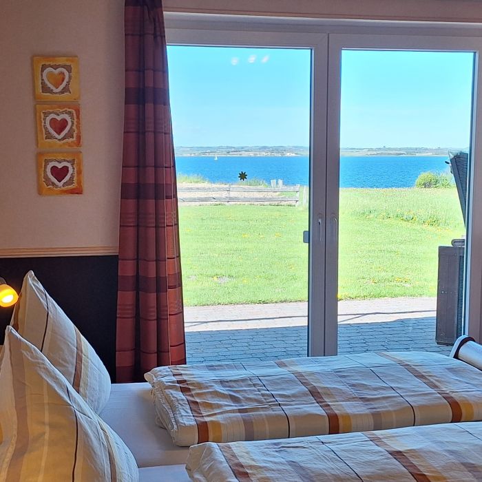 Schlafzimmer mit Blick auf's Meer